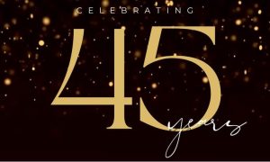 Gold text 'Celebrating 45 years' elegantly displayed on a sleek black background